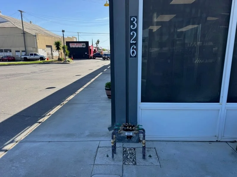 Custom cage installed over a backflow assembly for theft protection