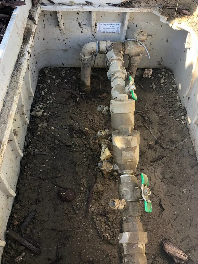 Residential backflow prevention assembly with brass ball valves
